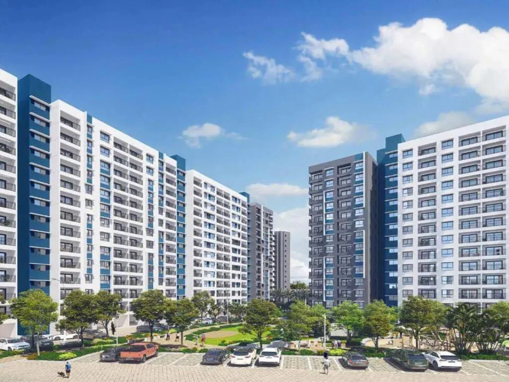 Adarsh Tropica site plan displaying the detailed layout of residential buildings, open spaces, amenities, and pathways for a well-organized living environment.